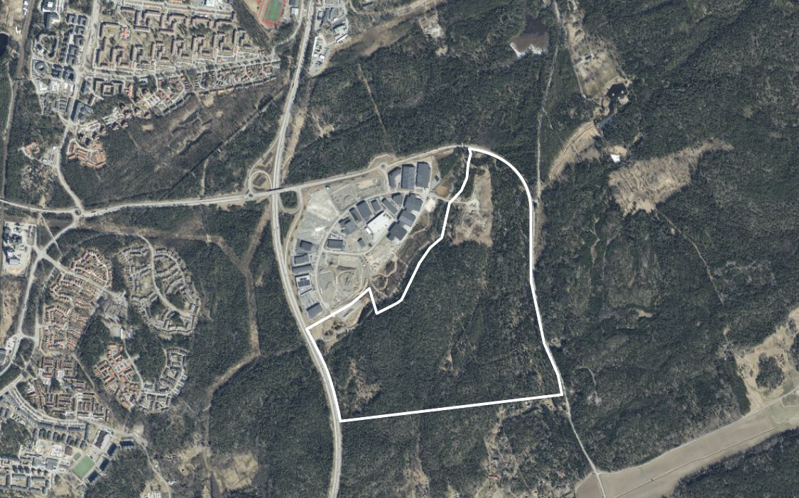 Flygfoto där planområdet är markerat.